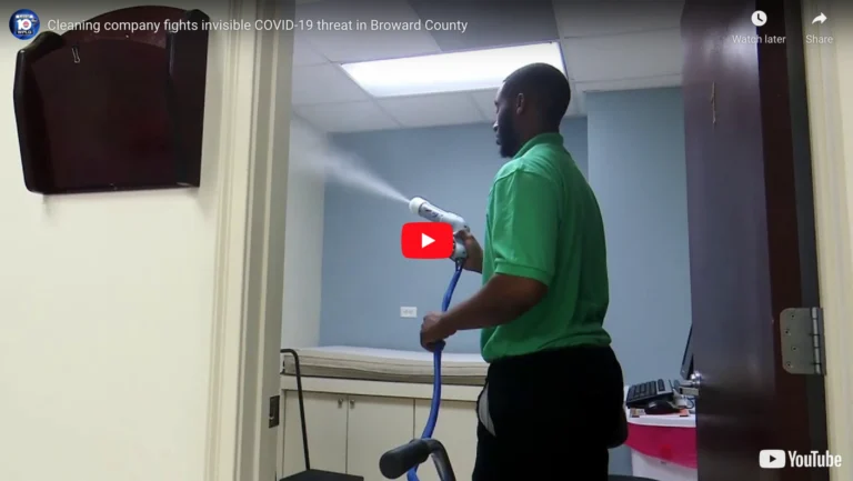 AK Building Services performing professional disinfection services in a healthcare facility during news coverage